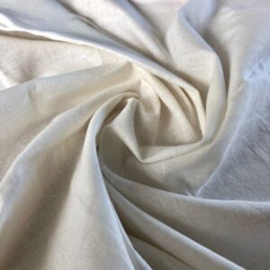 Close-up view of recycled cotton fabric with a soft texture, light density, and slightly off-white color.
