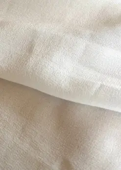 Discover the captivating beauty of silk georgette fabric! Crafted from 100% mulberry silk, this lightweight material boasts a luxurious texture, soft drape, and a touch of transparency.